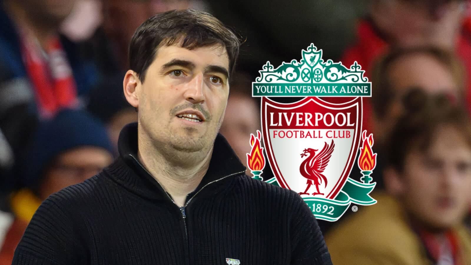 Hombre en el estadio con logo de Liverpool detrás