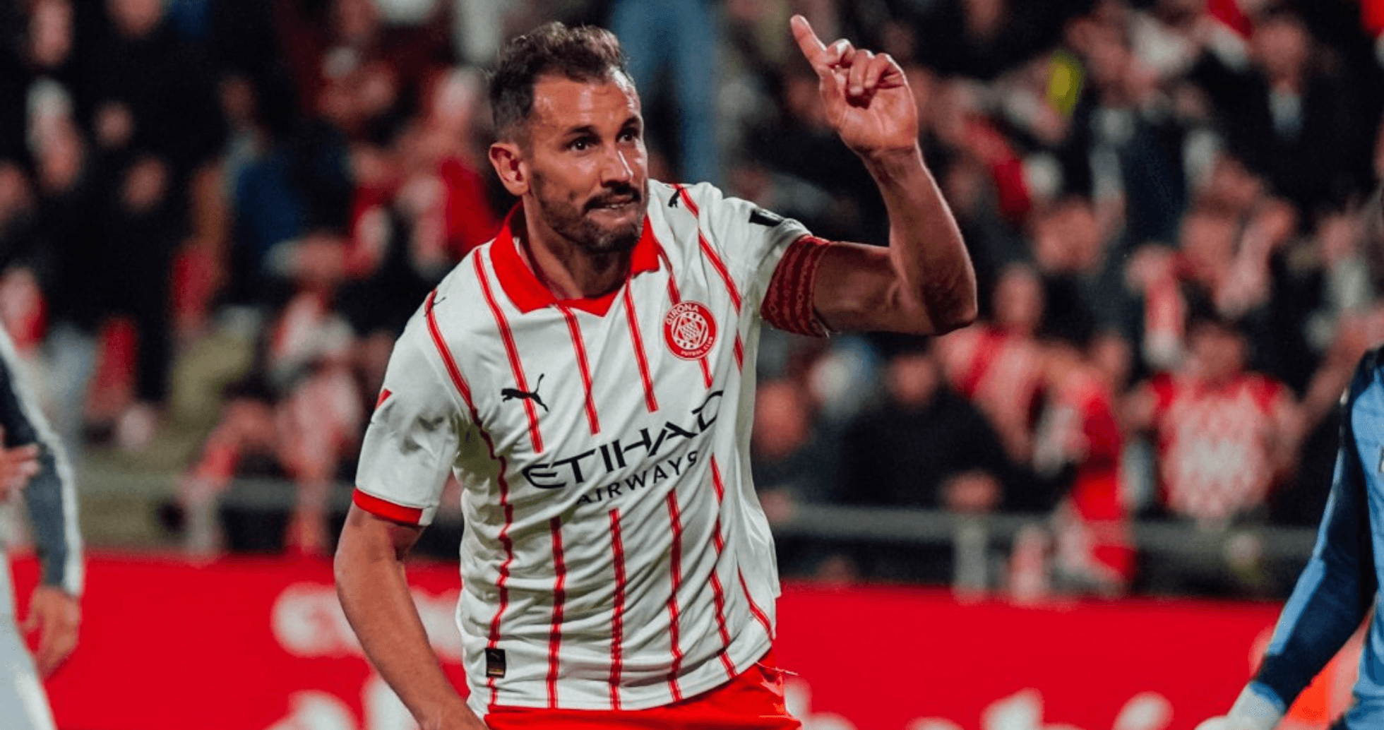 Jugador de Girona celebra un gol en La Liga