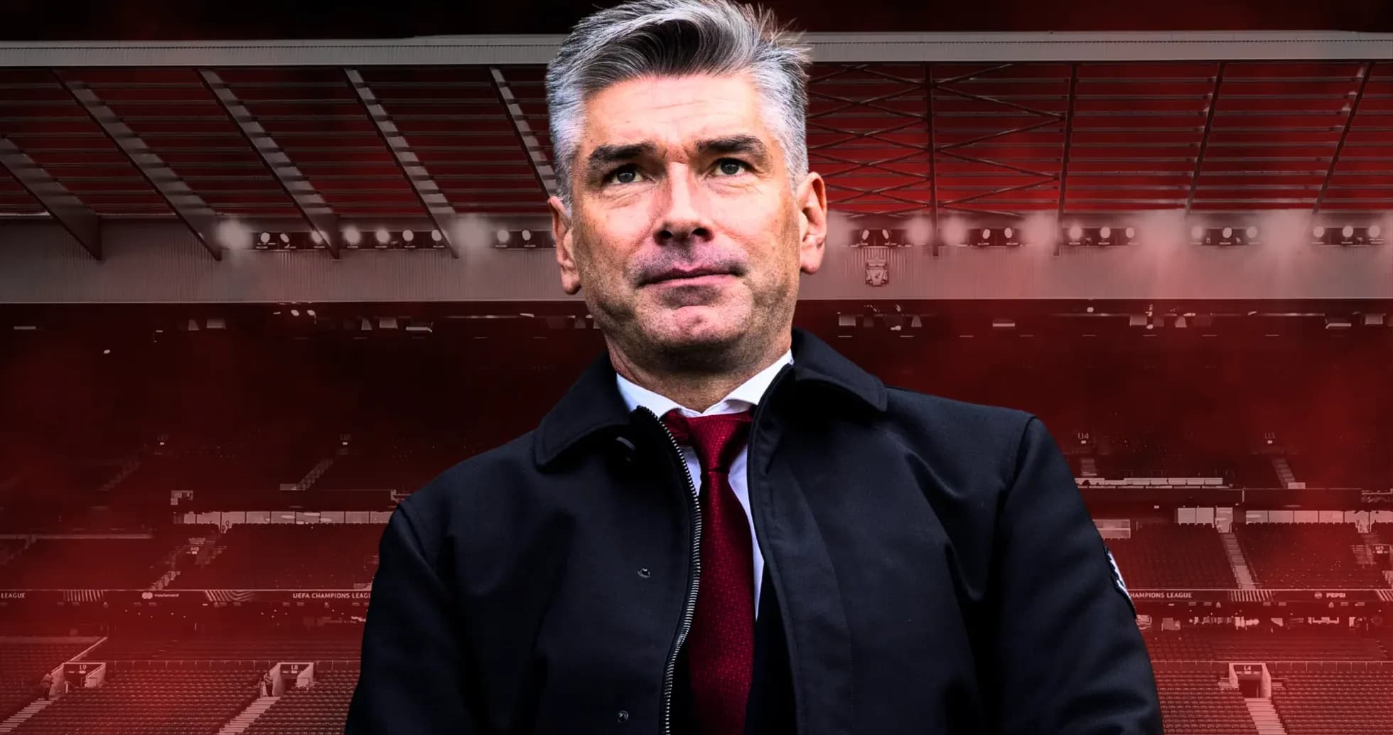 Entrenador posando frente a un estadio vacío