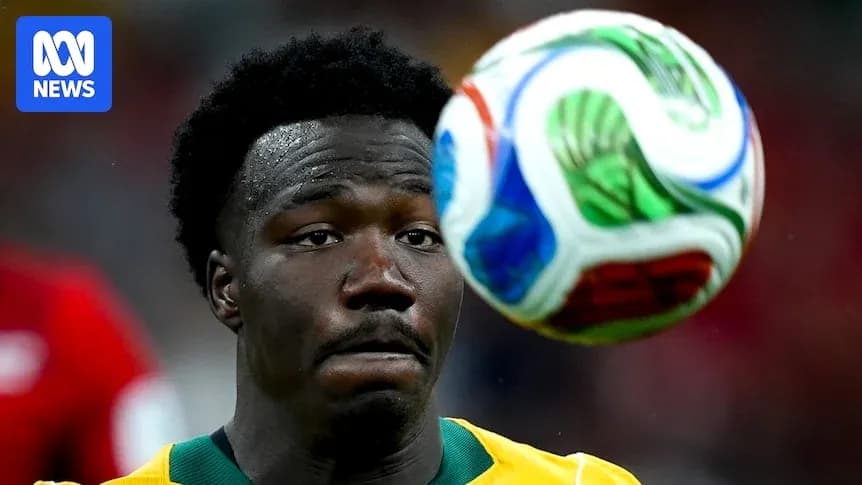 Jugador australiano controlando el balón durante partido