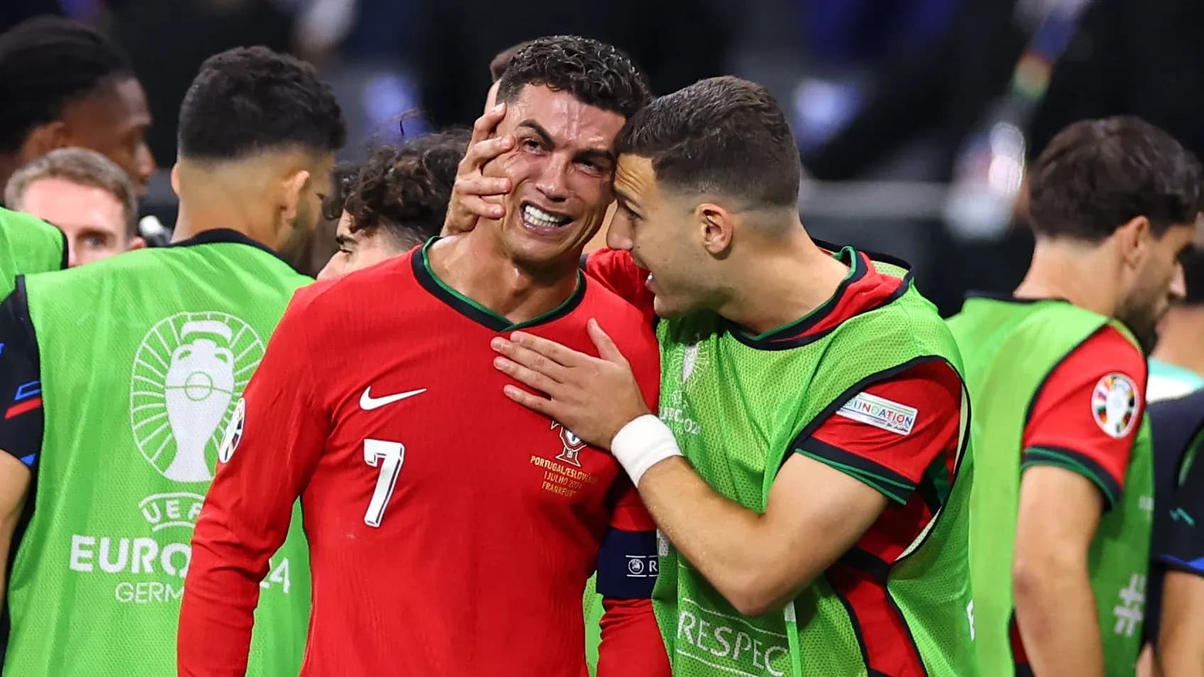 Cristiano Ronaldo celebrating with teammate after match