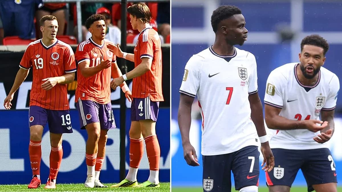Jugadores de Colombia y Inglaterra conversando en el campo