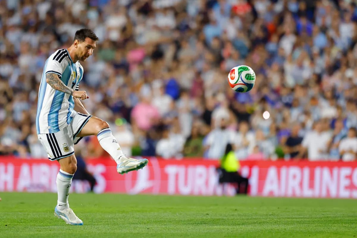 Lionel Messi kicking the ball during a match