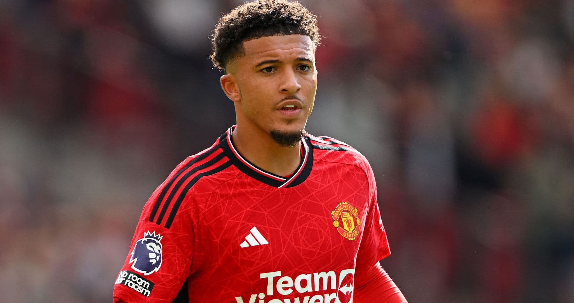 Jugador de Manchester United en camiseta roja